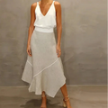 Conjunto Blusa com Decote em V e Saia Evasê Assimétrica Fellinne