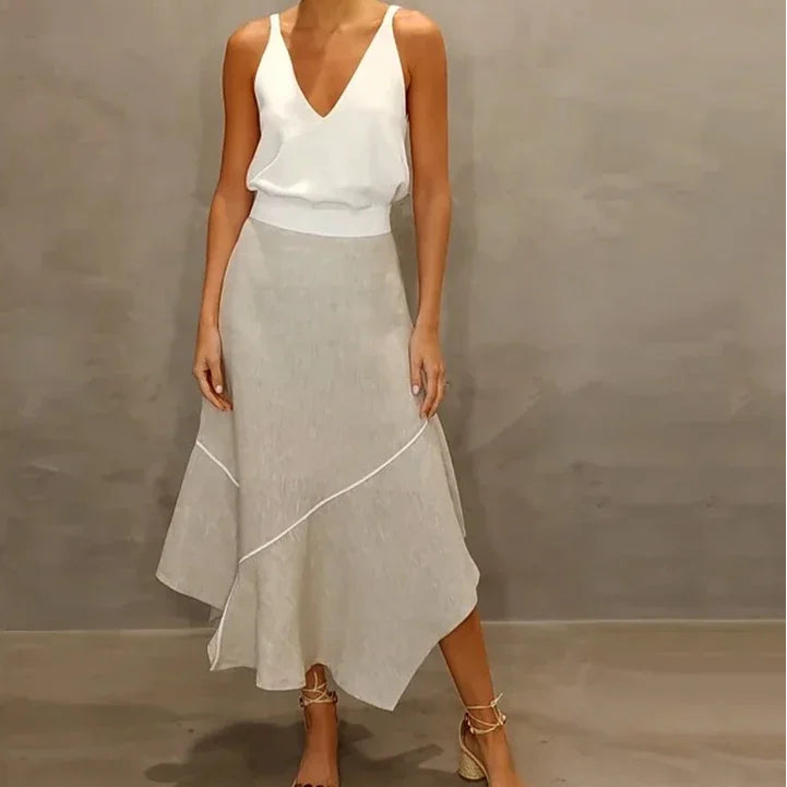 Conjunto Blusa com Decote em V e Saia Evasê Assimétrica Fellinne